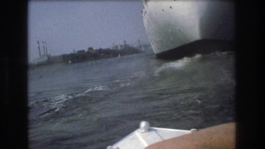 1975: view of a ship moving waves high boat angle view BOSTON