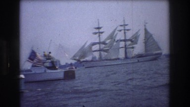 1976: ships sailing sea buildings people standing beautiful sight tourists