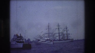 1976: mast ships are anchored in the water of the sea near to the shore NEW YORK
