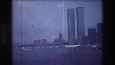 1976: city view high building water alongside NEW YORK CITY