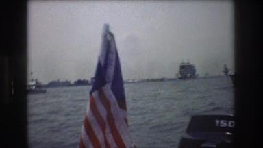 1976: boats, yachts and a large ship with sails out on the open water NEW YORK
