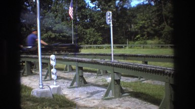 1975: family riding on a miniature train. BAXTER MAINE