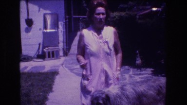1976: the front yard of the house with the mother, child and dog MT BROMLEY