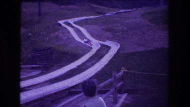 1976: people sliding down a slide on a hill MT BROMLEY VERMONT