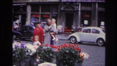 1967: Family of Five Selects Cut Flowers from Street Vendor on Paris Sidewalk