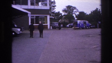 1967: two men walking into building PARIS FRANCE