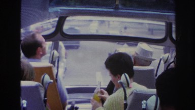 1967: Woman on Tour Bus Drinking Orange Soda Paris France
