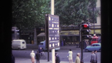 1967: busy road with people walking on the sidewalk PARIS FRANCE