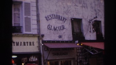 1967: a cute lady in red dress waiting at the restaurant on the roadside PARIS