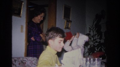 1966: family enjoys a small celebration in their living room. HOBOKEN NEW JERSEY