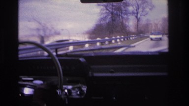 1966: the steering wheel and a dashboard of a driving car are shown HOBOKEN NEW
