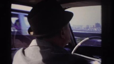 1966: viewing of a man driving in his car. HOBOKEN NEW JERSEY
