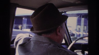 1966: a man sitting in the front seat wearing a brown hat HOBOKEN NEW JERSEY
