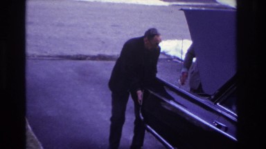 1966: looking in the trunk of a car. HOBOKEN NEW JERSEY