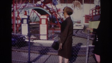 1967: observing the youngsters driving the cars at the amusement park