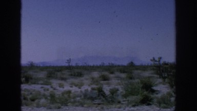 1962: woman walks dog by busy highway BLAINSPORT PENNSYLVANIA