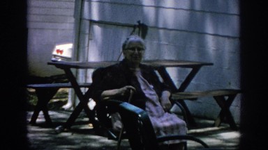 1962: old woman in wheelchair sitting by herself BLAINSPORT PENNSYLVANIA