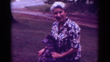 1962: woman holding pet cute tamed talking trees grass ground big ears RALEIGH