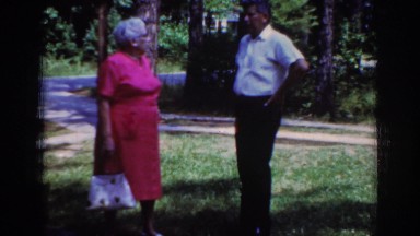 1962: older couple arguing out in the yard. RALEIGH NORTH CAROLINA