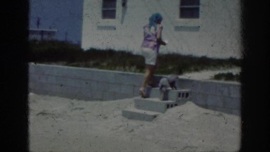 1962: on hands dog training by owner on a beautiful summers day. RALEIGH NORTH