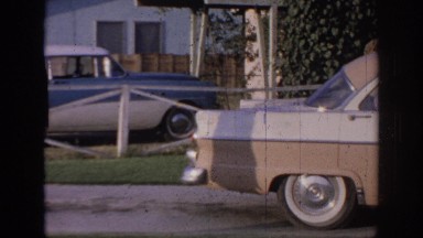 1967: soldier walks around car to enter house OKLAHOMA