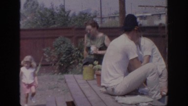 1967: a group of people gathered in a backyard for a barbecue OKLAHOMA