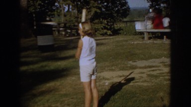 1967: girl outside playing baseball. OKLAHOMA