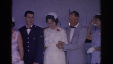 1967: newly wed couple with family posing for a photograph OKLAHOMA