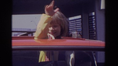 1973: girl waving out sunroof PHILADEPHIA PENNSYLVANIA