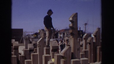 1973: adult and child climbing on feature in park PHILADEPHIA PENNSYLVANIA