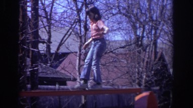 1973: girl trying to keep balance while walking the play plank. PHILADEPHIA