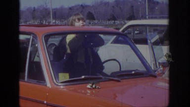 1973: child waving from a car sunroof. PHILADEPHIA PENNSYLVANIA