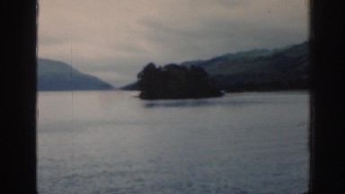 1961: View of Island in Lake and the Shoreline SCOTLAND