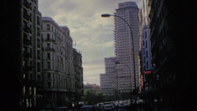 1966: A View of a Busy Street in the Middle of a Big City Spain