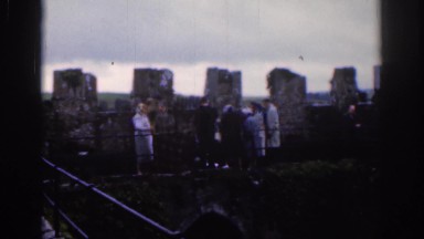 1961: the group of men walked along the bridge as steady as possible. DUBLIN