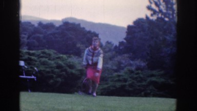 1961: a woman dancing in the front yard. DUBLIN IRELAND