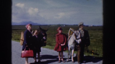1961: family walking down the road with their animals. DUBLIN IRELAND