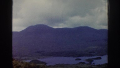 1961: a person, on an commercial airplane, takes aerial video of nature. IRELAND