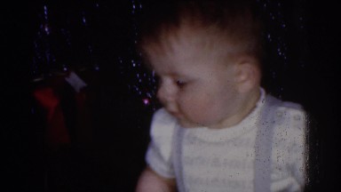 1968: Toddler Plays by Christmas Tree Omaha Nebraska