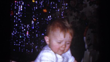 1968: little baby being pushed on his toy car. OMAHA NEBRASKA