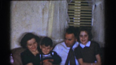 1968: family all sitting together on the couch. OMAHA NEBRASKA
