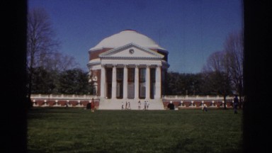 1971: little kid running and playing in front of a government building. RICHMOND