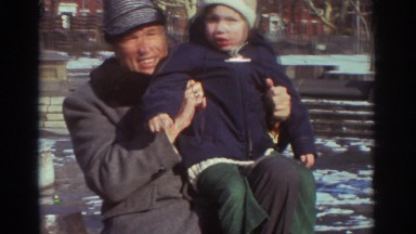 Father and Son Greet Camera in Snowy Bedford Virginia