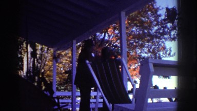 1976: relaxing on a patio by the seashore on a sunny day WATKINS GLEN NEW YORK
