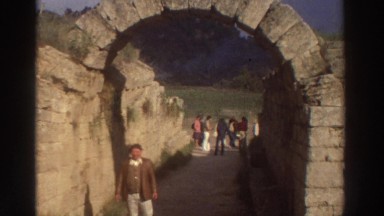 1976: Classic Keystone Archway Bridge Holding Up Ancient Stone Wall