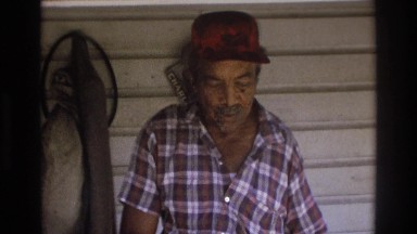1975: man on porch ATLANTA GEORGIA