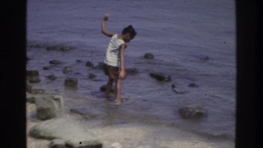 1975: little girl and boy paying along the lake. ATLANTA GEORGIA
