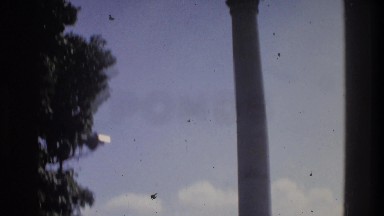 1975: man recording tell statue while observing the surrounding nature ATLANTA