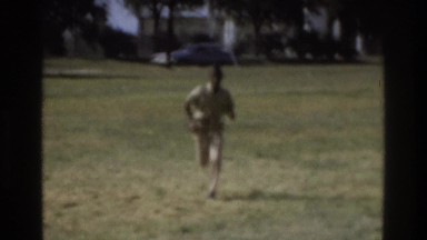 1975: military man running to meet his love. ATLANTA GEORGIA