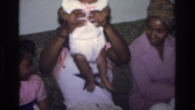 1975: family playing with the little baby. ATLANTA GEORGIA
